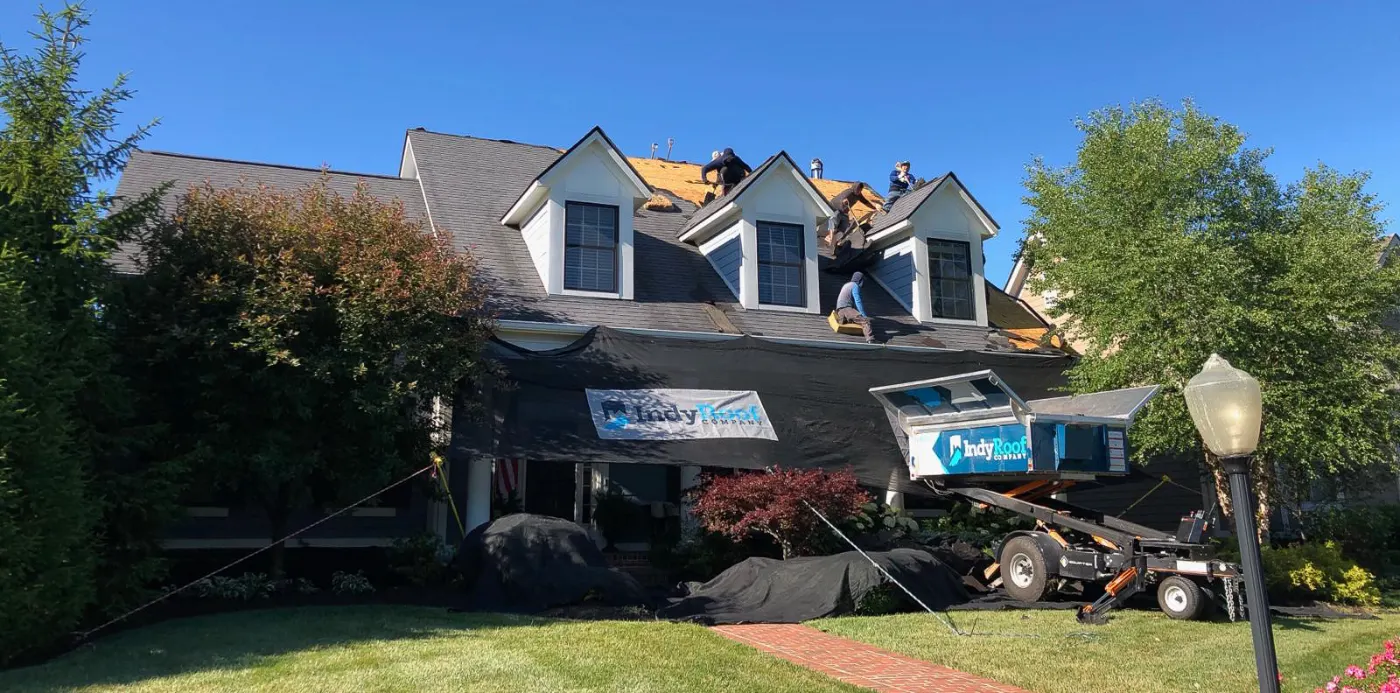 Tarping and dry-in on a Sunblest Farms commercial roof